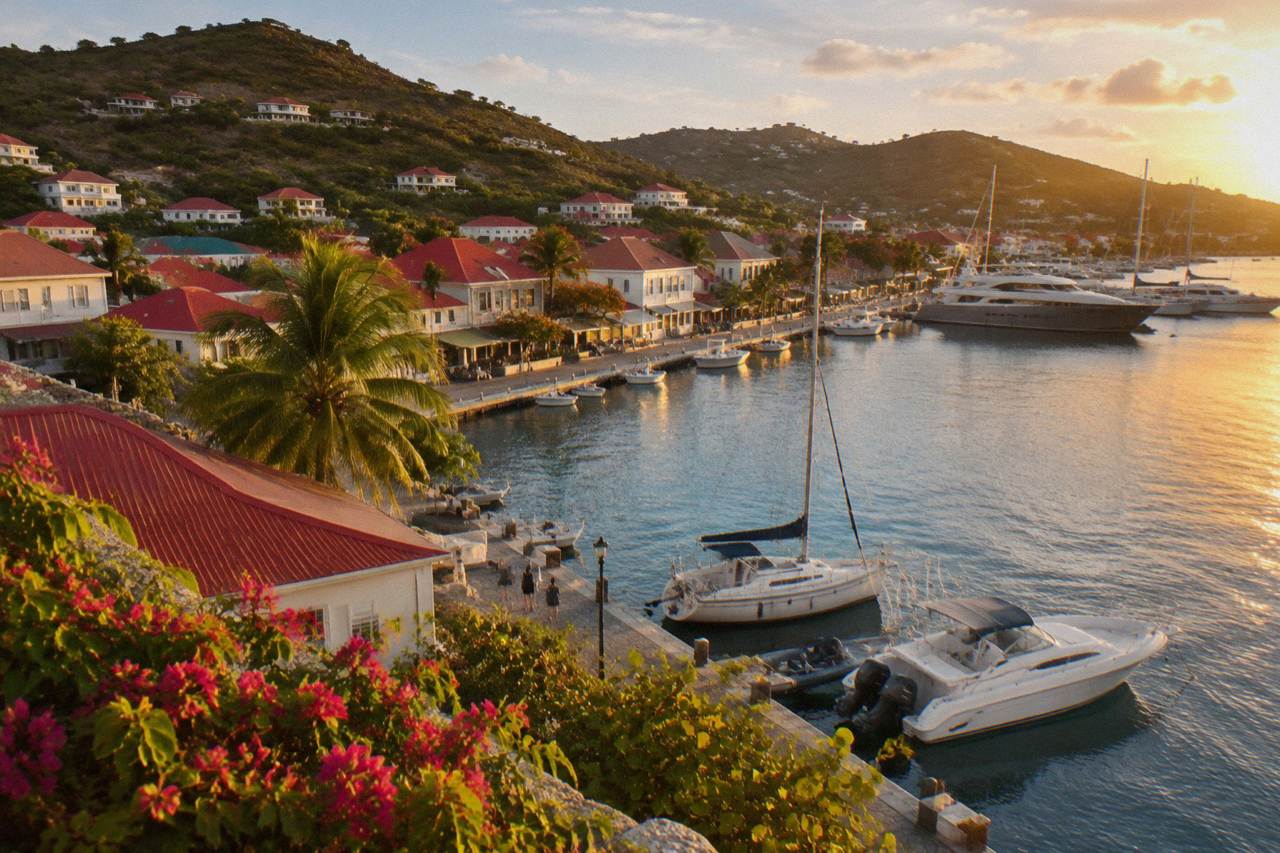 Evening light over the harbor in Gustavia, St Barts, with yachts moored along the quay
