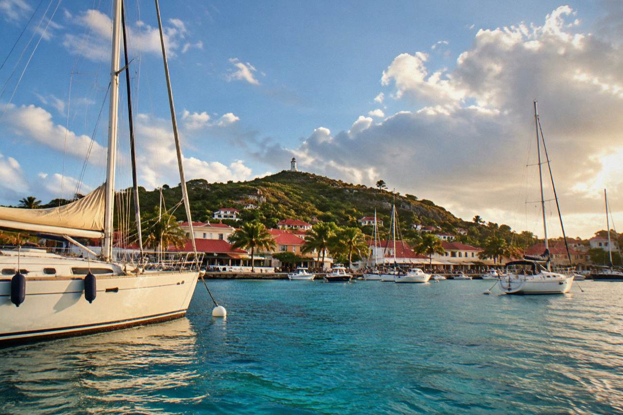 Red-roofed houses and sailboats in Gustavia harbor on the Caribbean island of St Barts