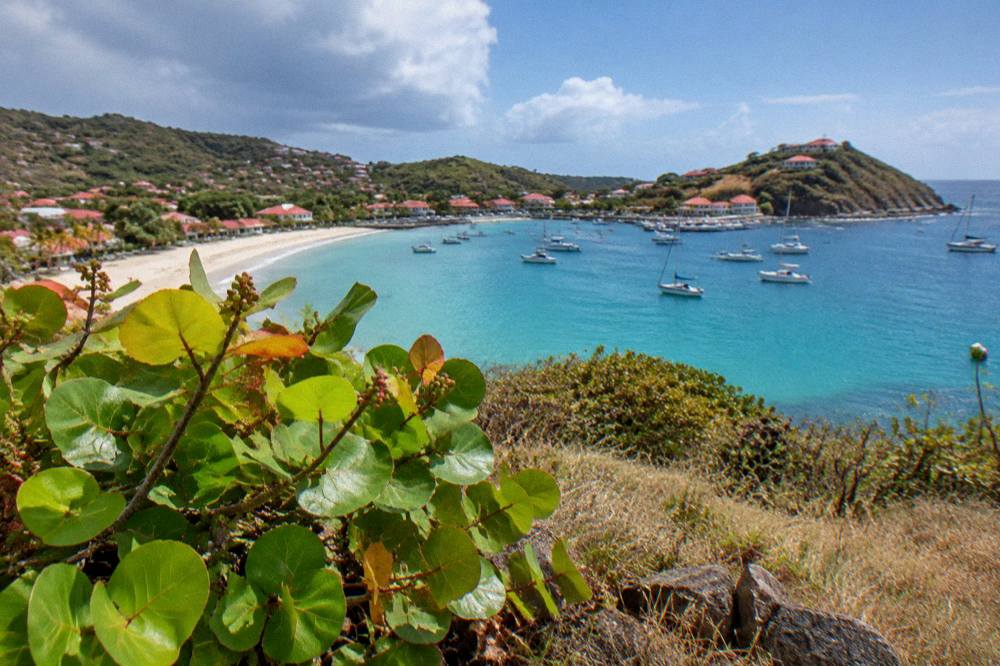 Low coastal hills and turquoise water at the southern edge of a Caribbean island