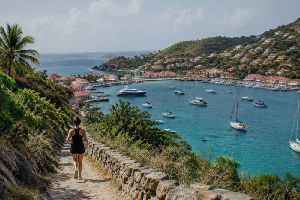 The harbor of Gustavia seen from a headland with boats at anchor below