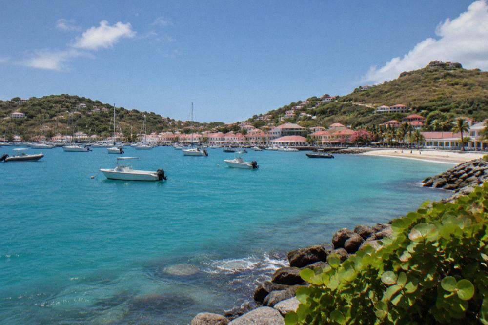 A rocky point separating two sandy bays on the coast of St Barts