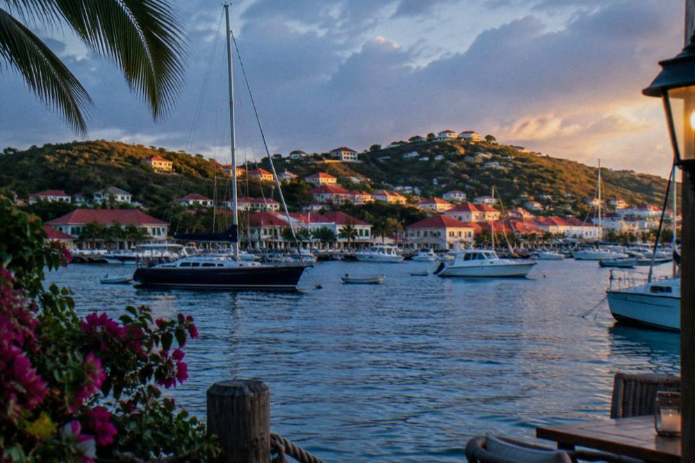 Golden late afternoon light on the red roofs of Gustavia from the harbor