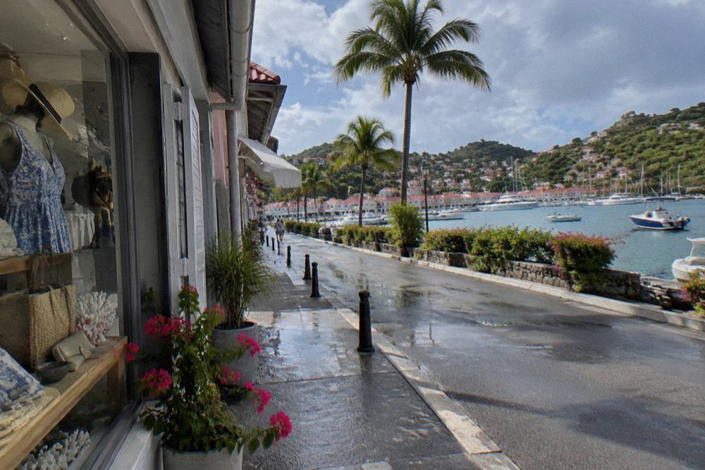 A shopfront in Gustavia displaying price tags in euros along a quiet street