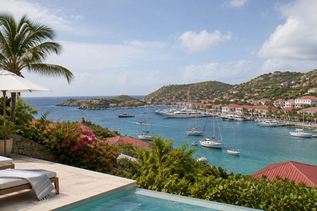 A hillside villa terrace above the water on a Caribbean island