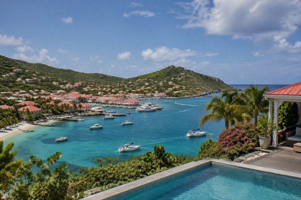 A hillside villa with a private pool overlooking the sea