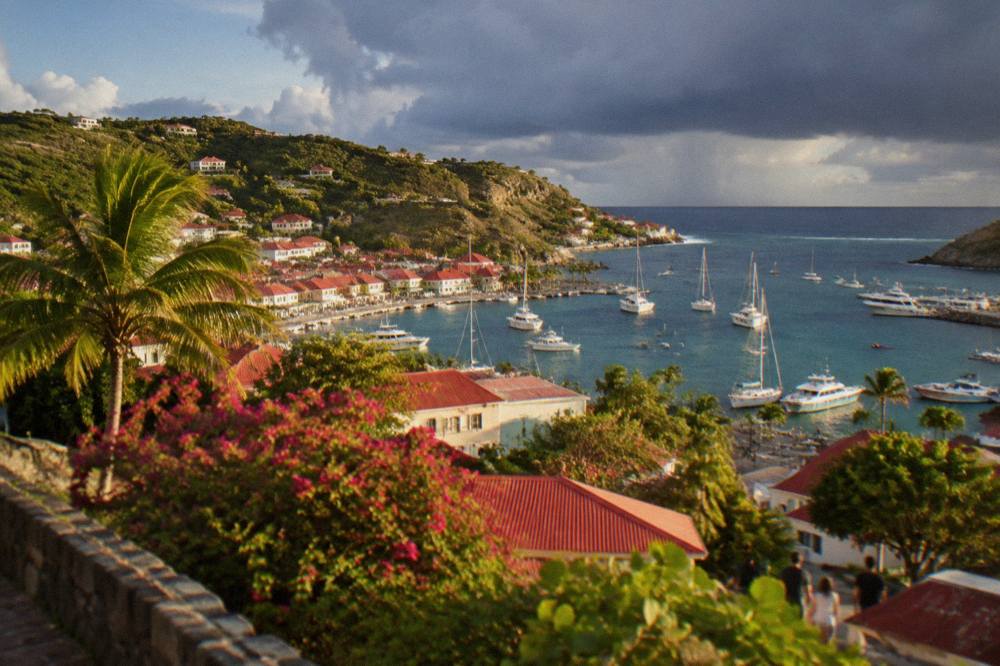 Dark storm clouds gathering over the coastline of St Barts near the sea