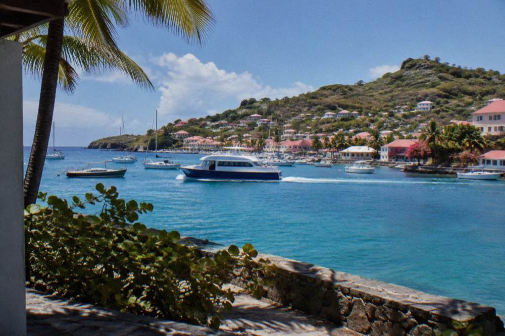 A passenger ferry crossing open water between St Martin and St Barts