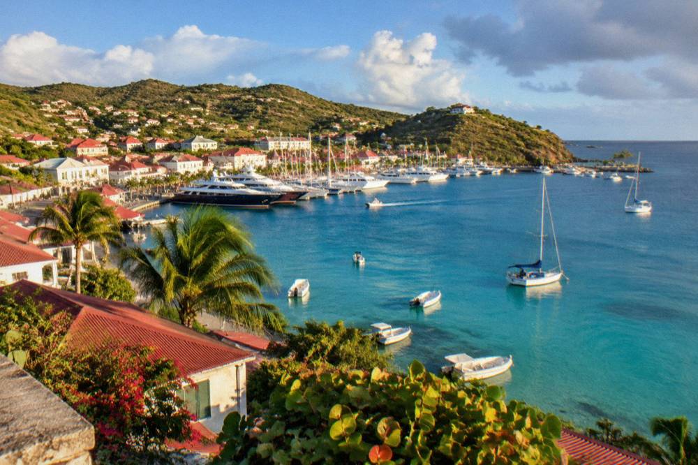 Clear turquoise water over a reef inside a protected bay in St Barts