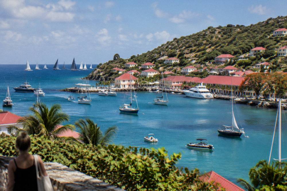 Sailing yachts racing offshore of St Barts under a blue sky
