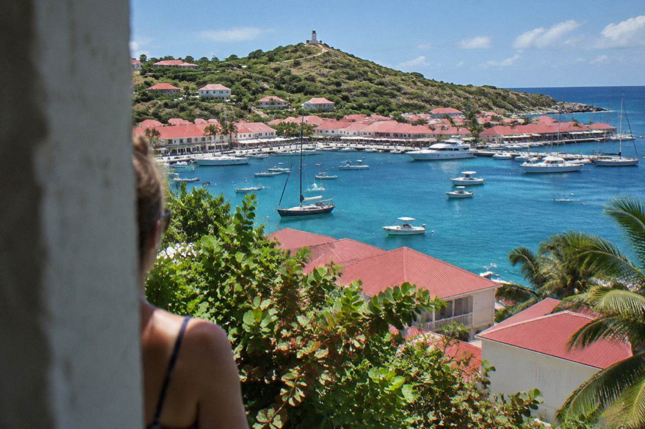 Red rooftops of Gustavia harbour seen from the hillside above the port on St Barts
