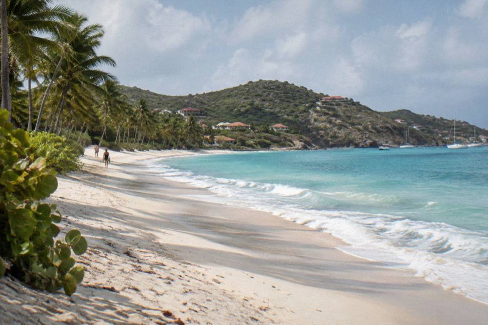White sand beach at Flamands on the north coast of St Barts with gentle waves