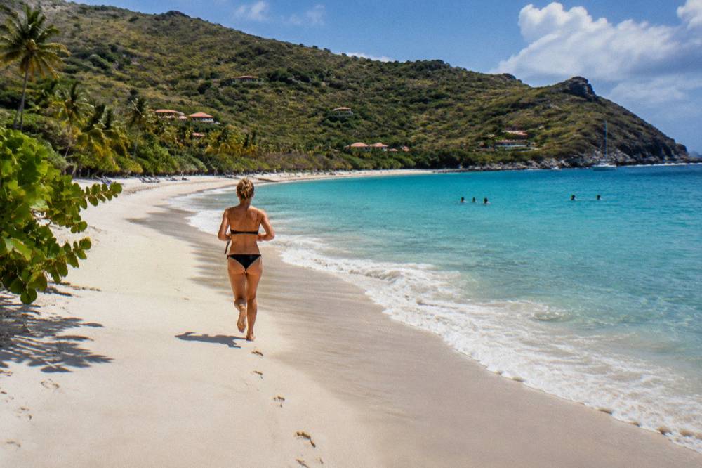 Wide crescent of sand at Gouverneur beach on the south coast of St Barts
